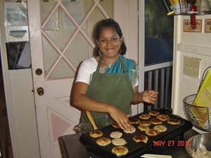 Our dear Vrinda Didi cooks Aloo tikkis in Ghee for the offering.