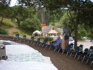 Chairs where placed for the devotees to sit right next to the newly built wall, Hasyapriya Prabhu was remembering that a month ago if the devotees would have sat there everybody would have rolled down the hill!