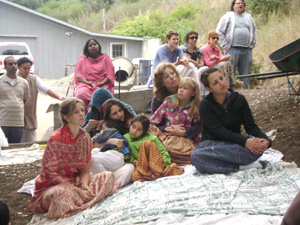 The devotees listen attentively.