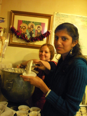 Kumaris Rohini and Devaki help with the cupcakes.