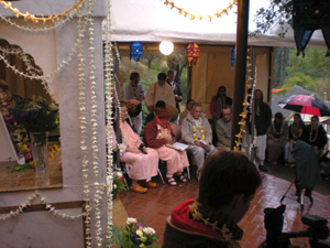 Srila Janardan Maharaj leads the devotees in more kirtan.