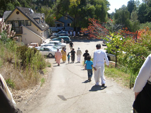 The devotees return to the Temple to honor Prasadam.