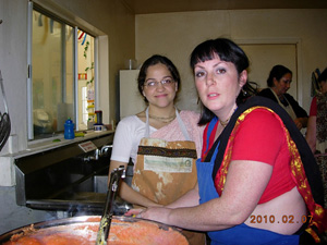 Annapurna and Rasa Rajani Devi Dasis  The Menu
												<ol>
													<li>Dahl with green papaya</li>
													<li>Sak</li>
													<li>Tomato, Sweet Potato Sabji with Curd balls</li>
													<li>Potato Cauliflower Curd Sabji</li>
													<li>Rice</li>
													<li>Shukta</li>
													<li>Matza Ball Soup</li>
													<li>Pasta with Sauce</li>
													<li>Samosa</li>
													<li>Cauliflower Pakora</li>
													<li>Tomato Chutney</li>
													<li>Tamarind Chutney</li>
													<li>Iddli</li>
													<li>Coconut Chutney</li>
													<li>Avacado, Cucumber and Jicama salad</li>
													<li>Raita</li>
													<li>Chapatis</li>
												</ol>