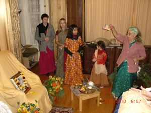 Vimala Didi performs special arati for Srila Gurudeva.