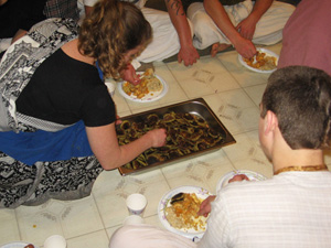 Radhika Devi served aloo tikis after cooking expertly for hours under the direction of Sanatani Devi.