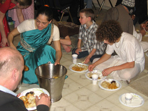 Annapurna Devi also spent hours in the kitchen, and then served Prasadam to the Vaishnavas.