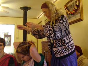 Srimati Vimala Didi places neckbeads on her niece Mariel.